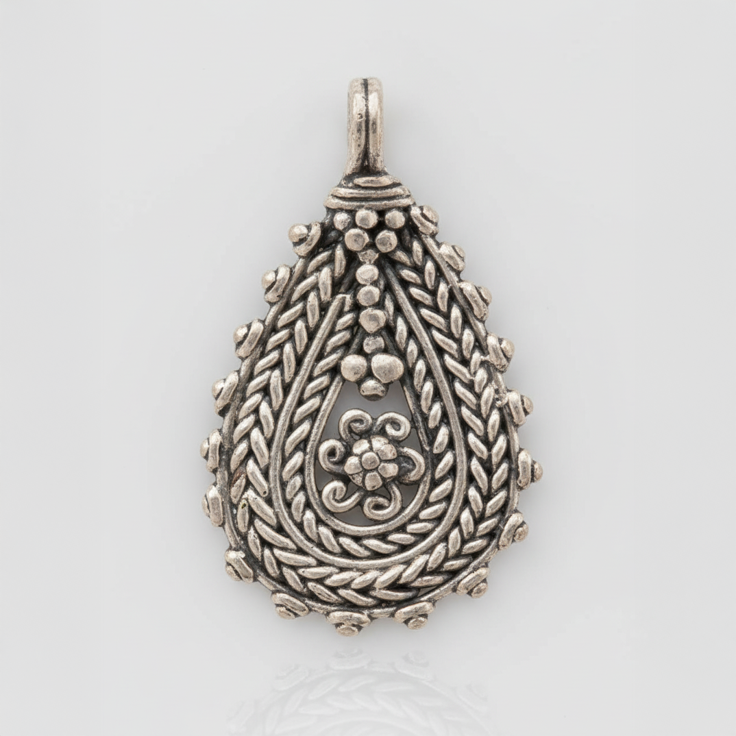 Dhokra Teardrop Pendant in Antique Silver